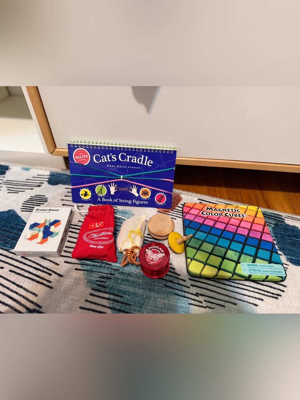 Toy bundle: Klutz Cat's Cradle book, Snake Block puzzle, magnetic tiles, more